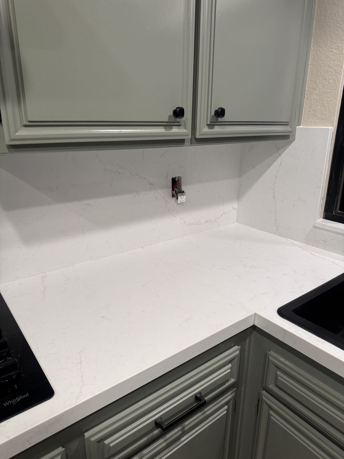 Seamless corner — counter into full-height splash — kitchen countertop installation