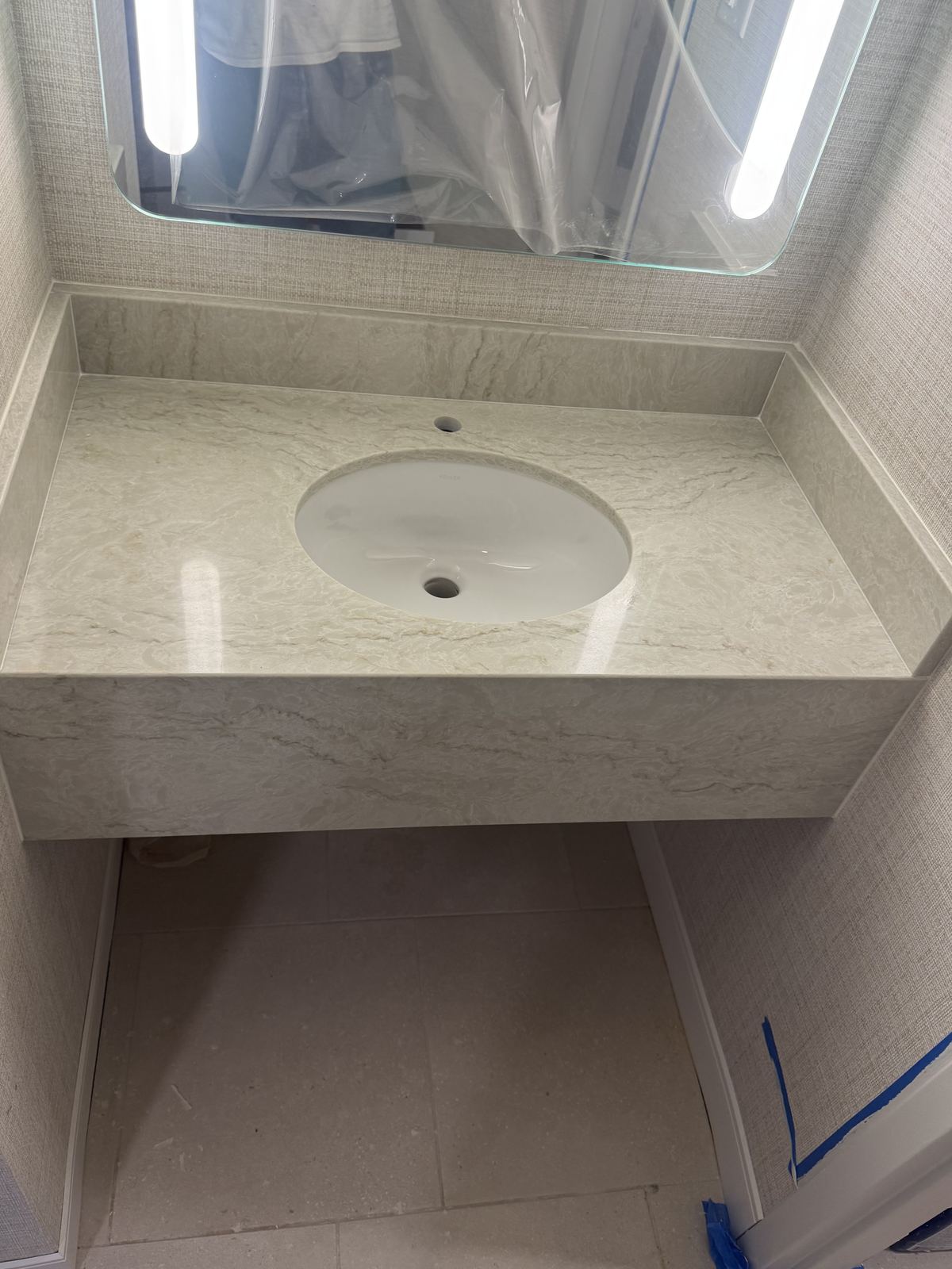Floating vanity with full apron & sidesplashes — bathroom vanity countertop