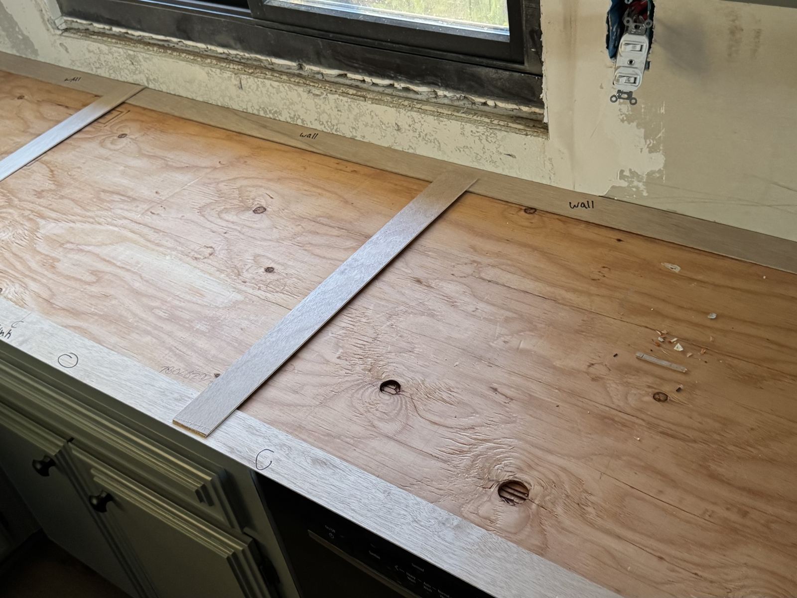 Template run marked wall to wall — countertop fabrication process